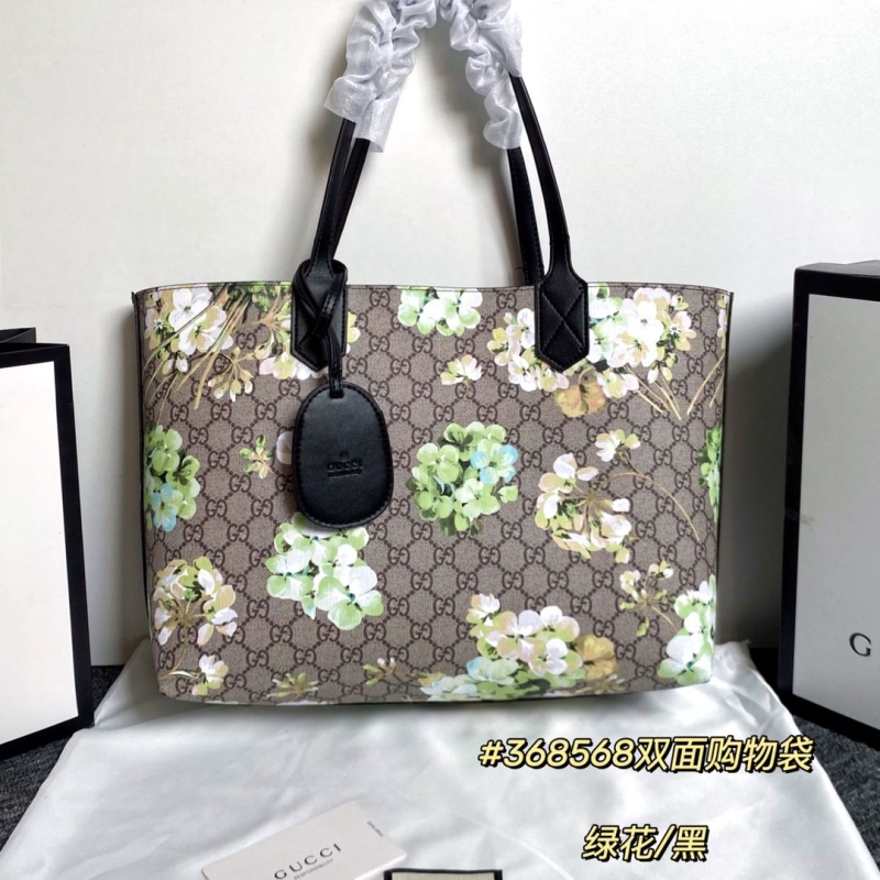 G*u*i shopping bags
